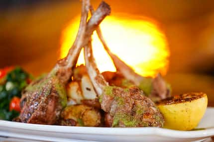 Grilled spicy lamb chops made the menu for the first night of service at Cafe Nubia in...