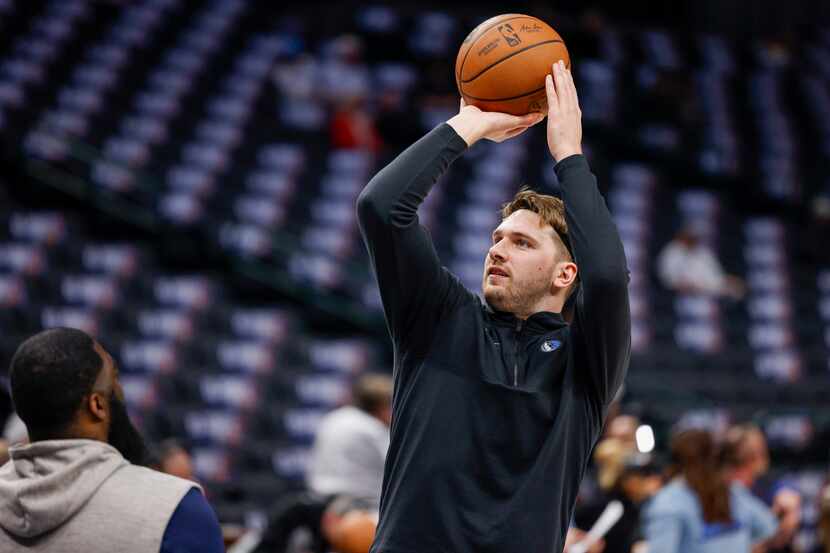 Dallas Mavericks guard Luka Doncic warms up before an NBA game against the Los Angeles...