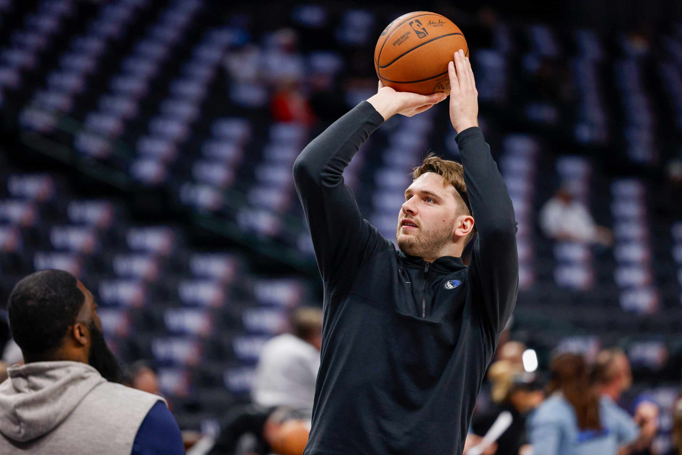 Dallas Mavericks guard Luka Doncic warms up before an NBA game against the Los Angeles...