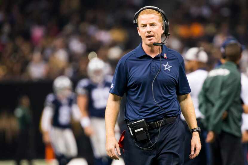 Dallas Cowboys head coach Jason Garrett paces the sidelines during the first half of an NFL...