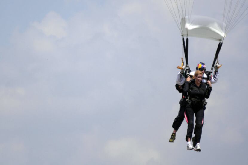 Irving Mayor Beth Van Duyne tandem sky-dives with Luke Aikins, a member of the Red Bull Air...