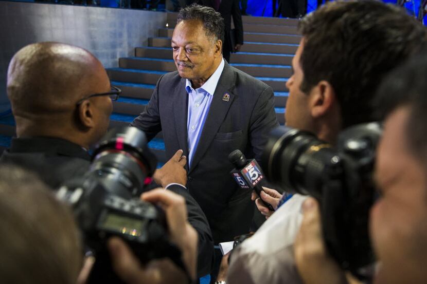 FILE - Jesse Jackson talks to members of the media during a sound check before Day 3 of the...