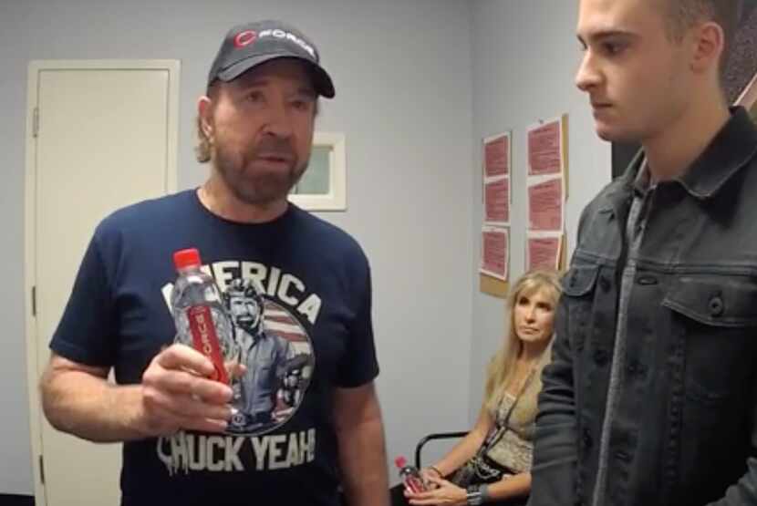 Chuck Norris chats with Dallasnews.com digital producer Don DiFurio at Texas Motor Speedway.