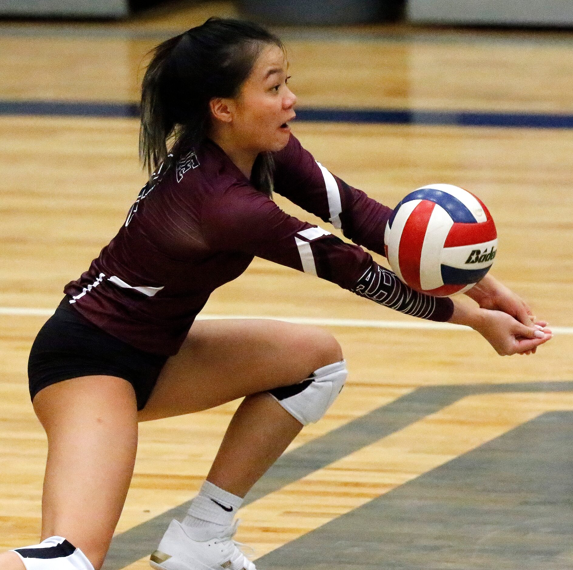 Wylie High School outside hitter Victoria Vo (2) receives a hit during game one as Sachse...