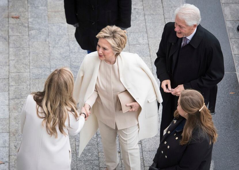 Former Secretary of State Hillary Clinton and her husband, former President Bill Clinton...