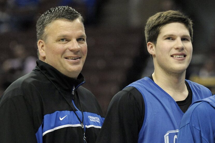 Creighton head coach Greg McDermott, left, and his son Doug McDermott pose for a team photo...