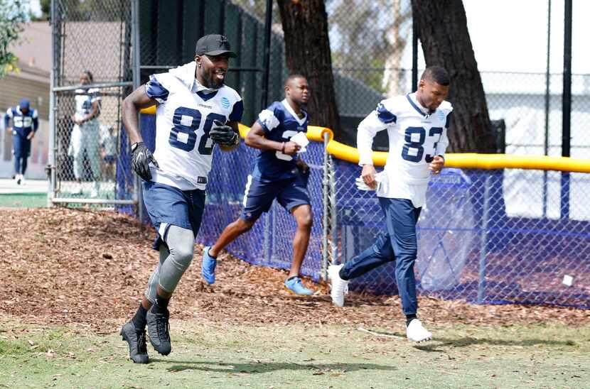 Dallas Cowboys wide receiver Dez Bryant (88), Dallas Cowboys cornerback Marquez White (39)...