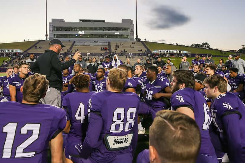 Stephen F. Austin Lumberjacks head coach Colby Carthel speaks to players after the college...