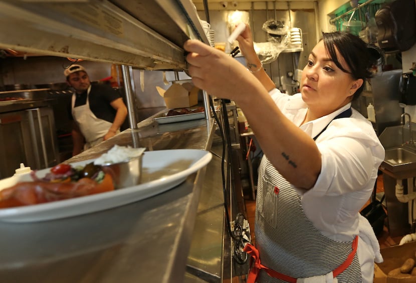 Chef Anastacia Quinones in the kitchen at Oddfellows  (Louis DeLuca/Staff Photographer)