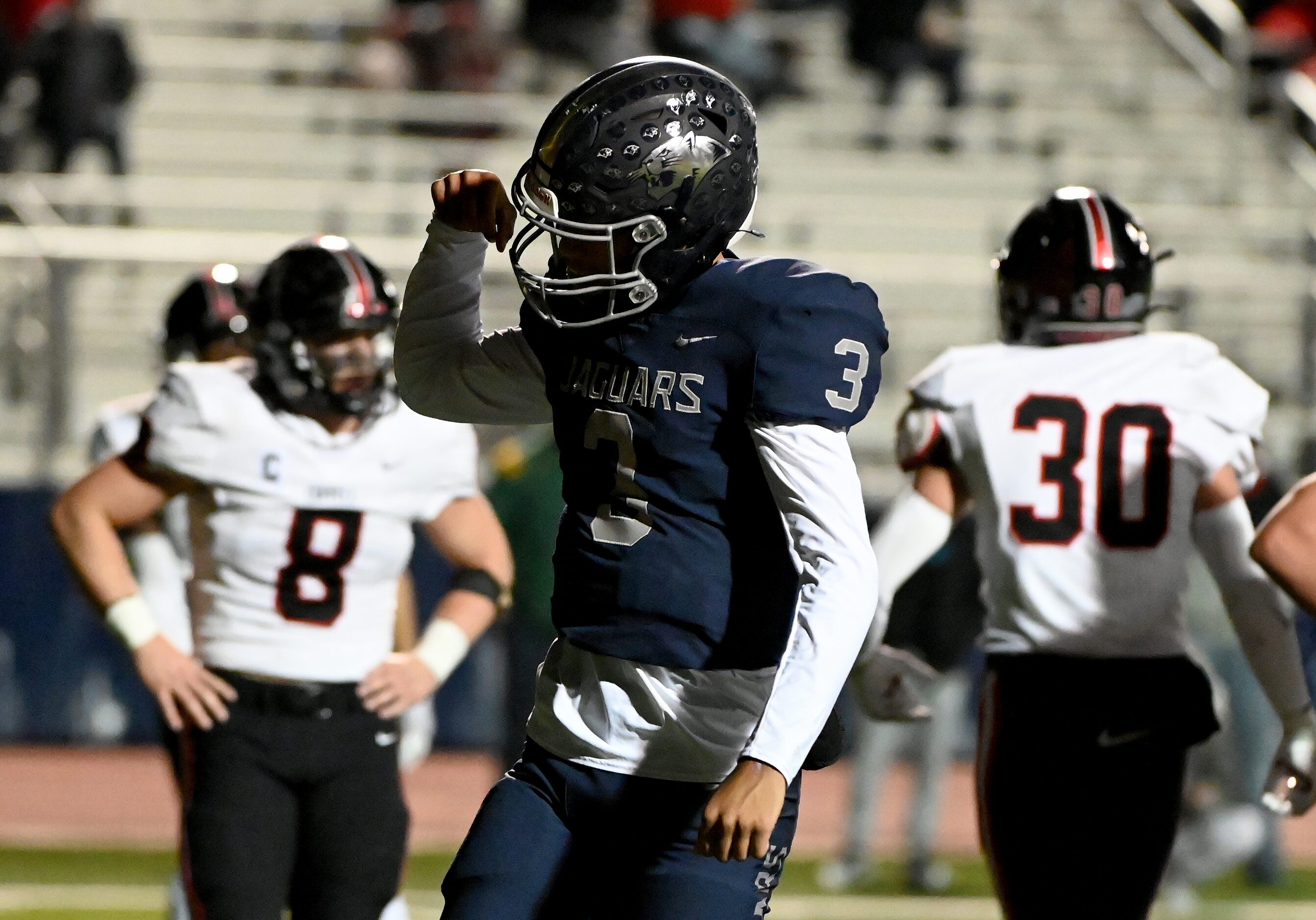 Flower Mound quarterback Nick Evers (3) celebrates after his touchdown run in the second...