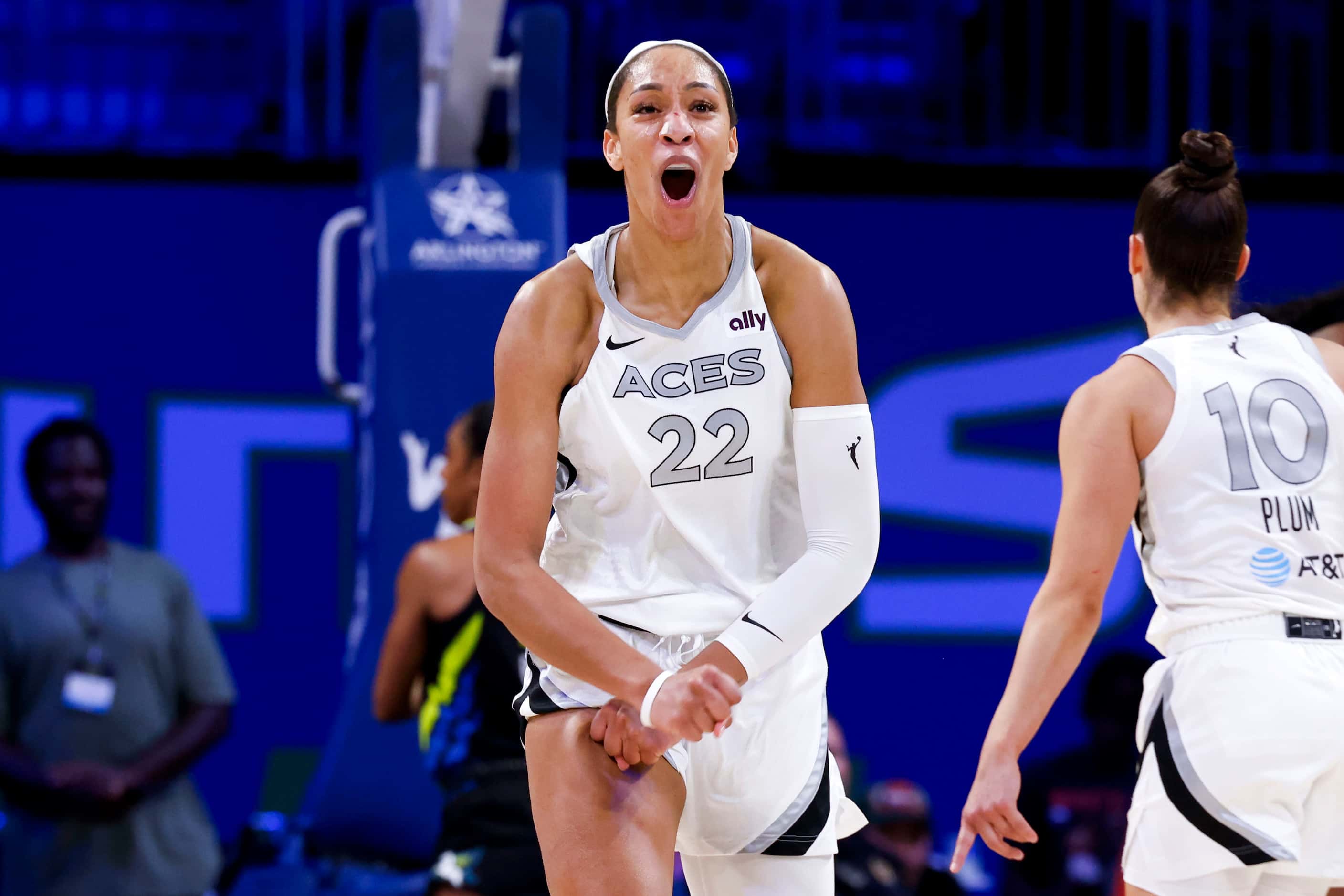 Las Vegas Aces center A'ja Wilson reacts after scoring from a three-pointer against the...