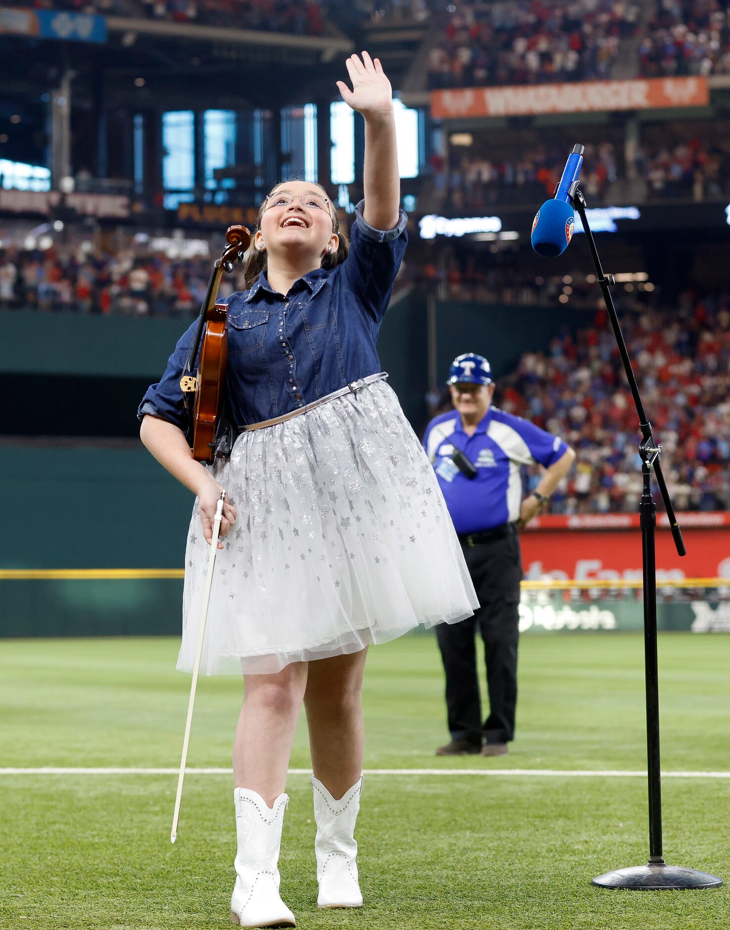 Violinist Sabrina Patel, 11, performed God Bless America during the seventh inning stretch...