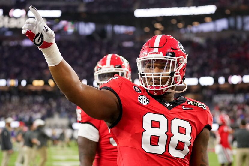 FILE - Georgia defensive lineman Jalen Carter (88) waves to the crowd before the national...