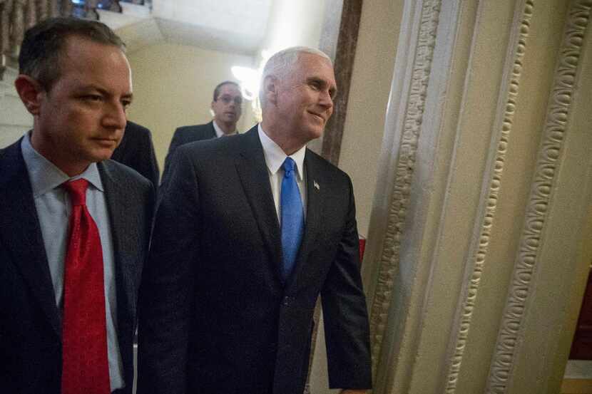 Vice President Mike Pence, center, and White House Chief of Staff Reince Priebus arrive on...