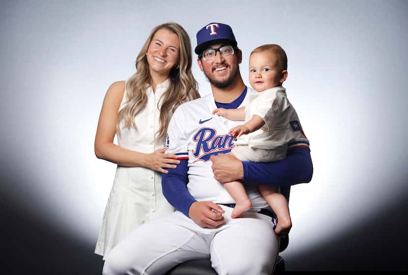 Texas Rangers Dane Dunning and his wife, Rachel, and son, Mack, at Globe Life Field in...
