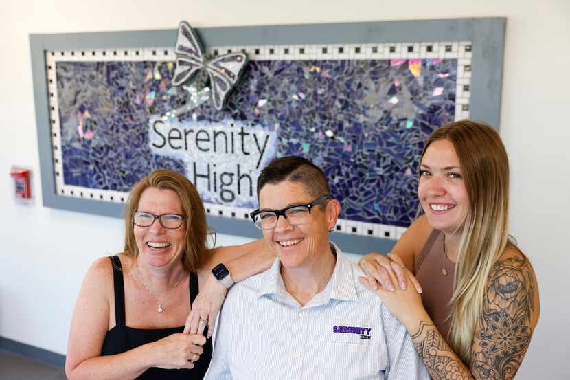 Mother of a Serenity High School graduate Tina Swindle (left), dean Allie Long (center), and...