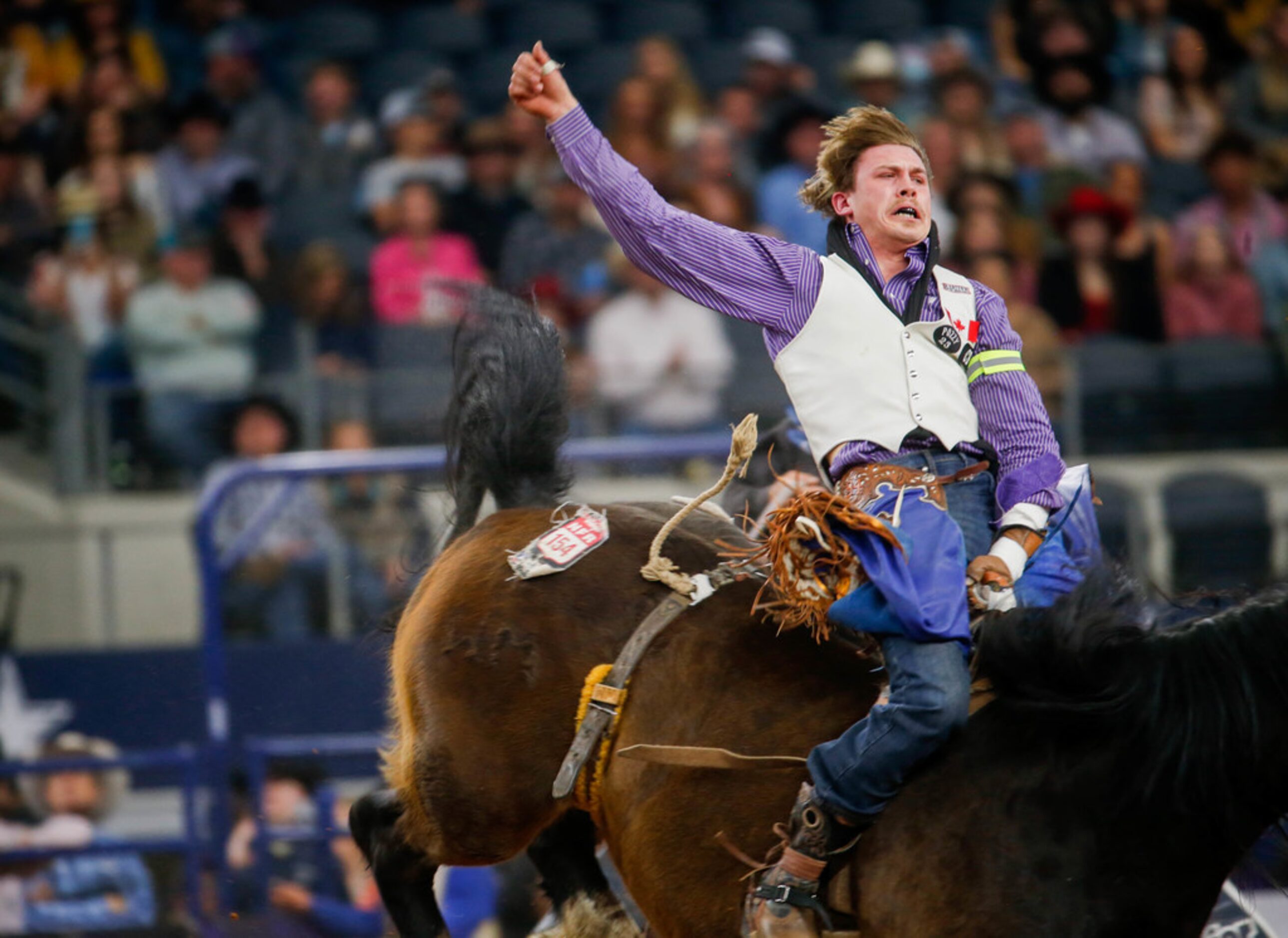 Bareback rider Kody Lamb competes in RFD-TV's The American rodeo at AT&T Stadium on March 8,...