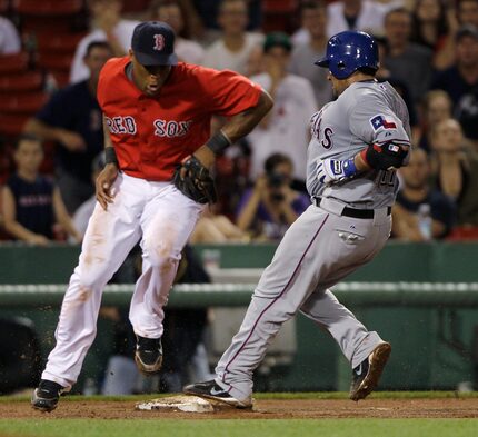 FILE - Bengie Molina pulls into third base with a triple, completing a cycle against Adrian...