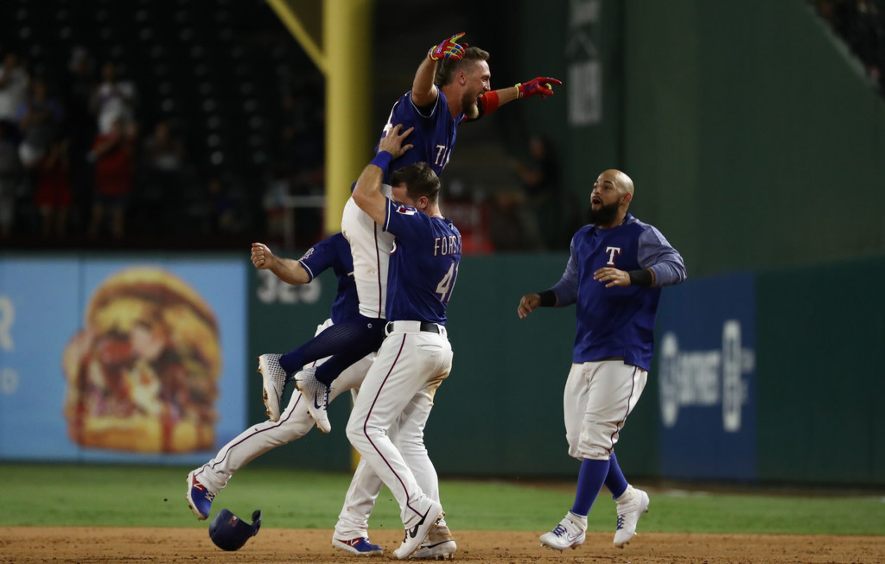 ARLINGTON, TEXAS - AUGUST 21:  Hunter Pence #24 of the Texas Rangers celebrates a walk off...