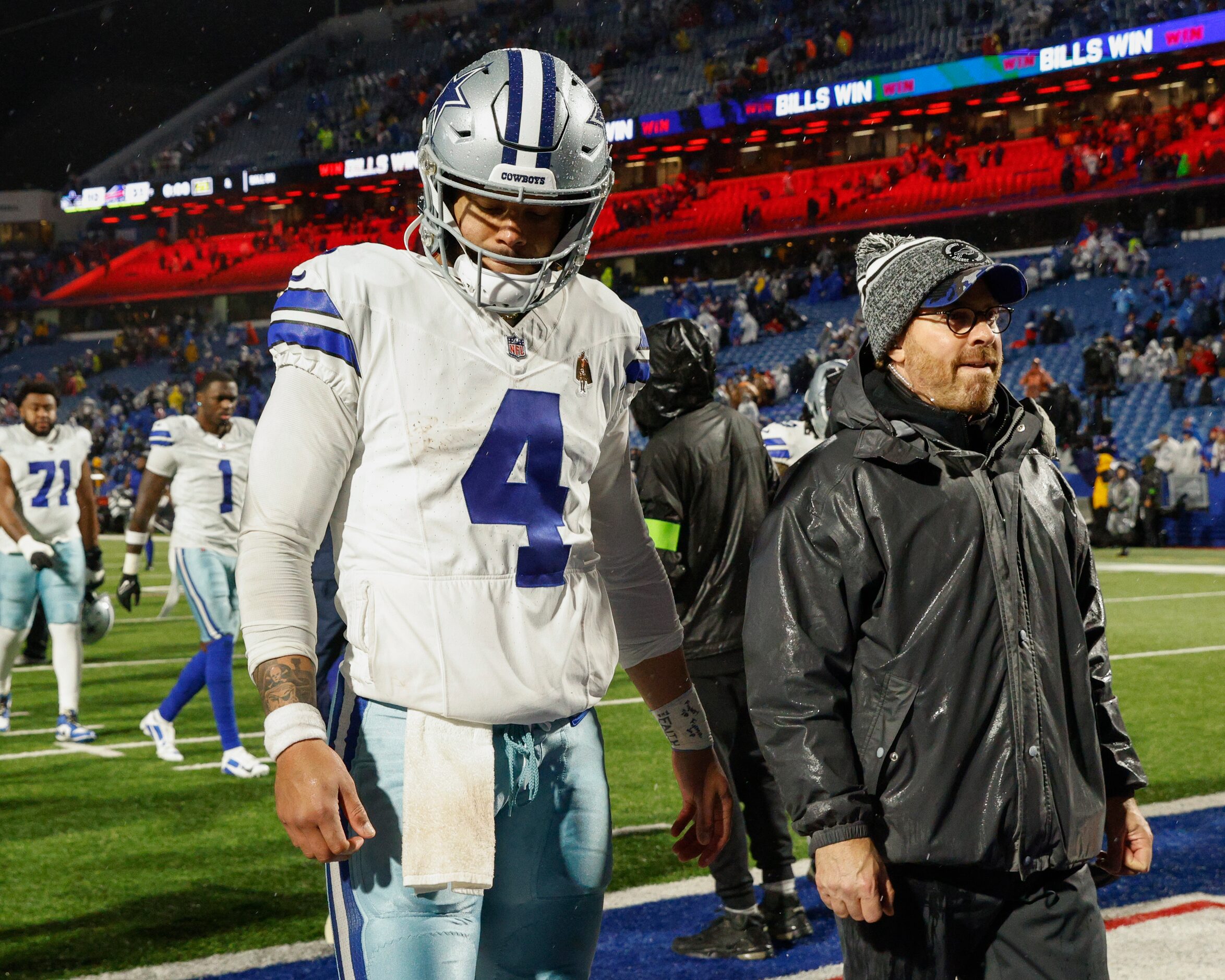 Dallas Cowboys quarterback Dak Prescott (4) walks off the field after an NFL game against...