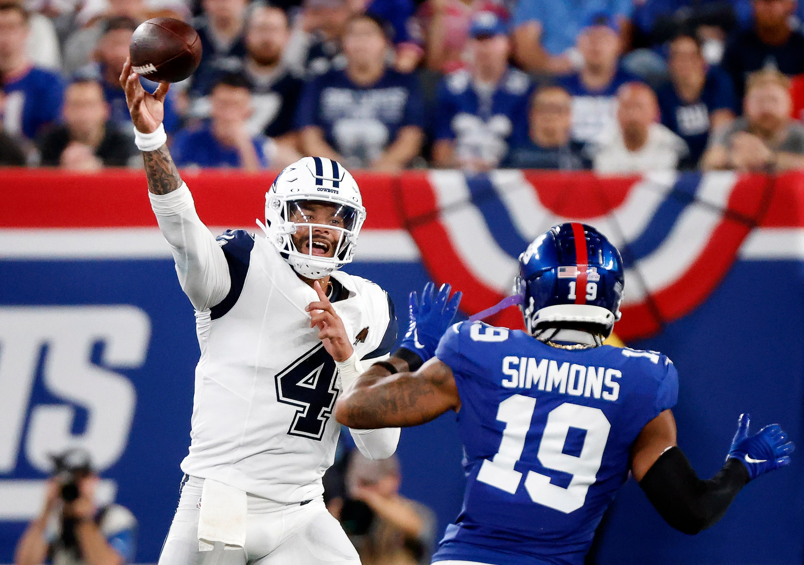 Dallas Cowboys quarterback Dak Prescott (4) throws a first half pass against New York Giants...