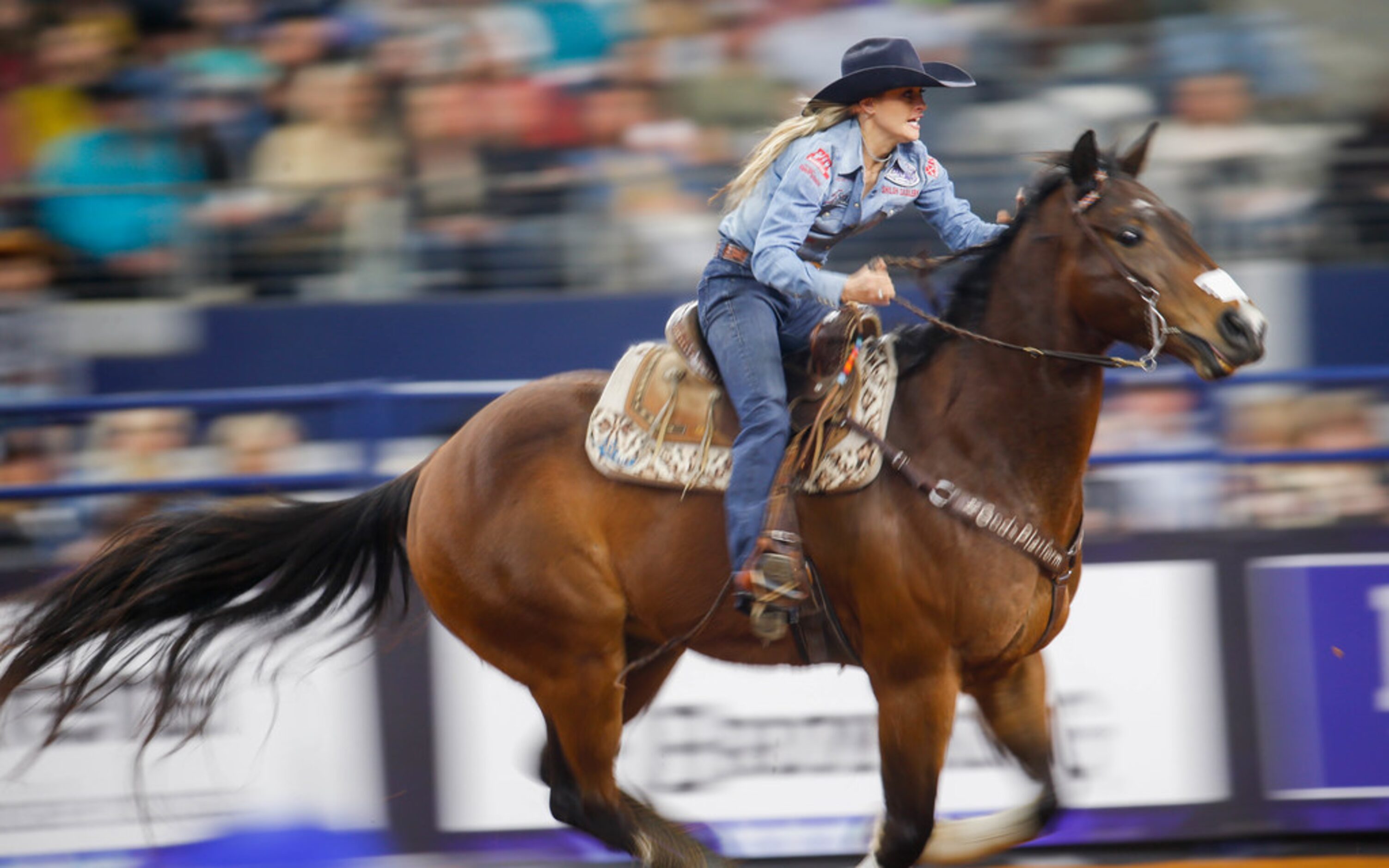 Stevi Hillman of Weatherford, OK competes in the barrel racing competition of RFD-TV's The...