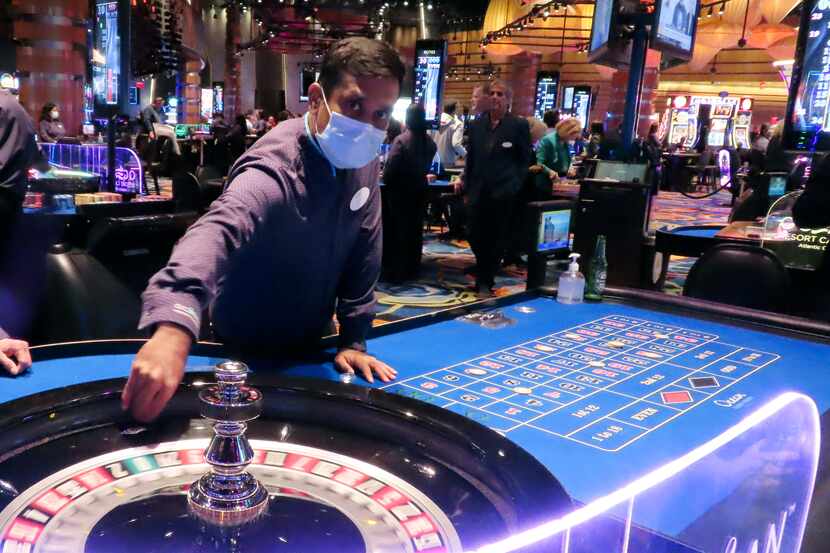 A dealer conducts a game of roulette at the Ocean Casino Resort in Atlantic City, N.J. on...