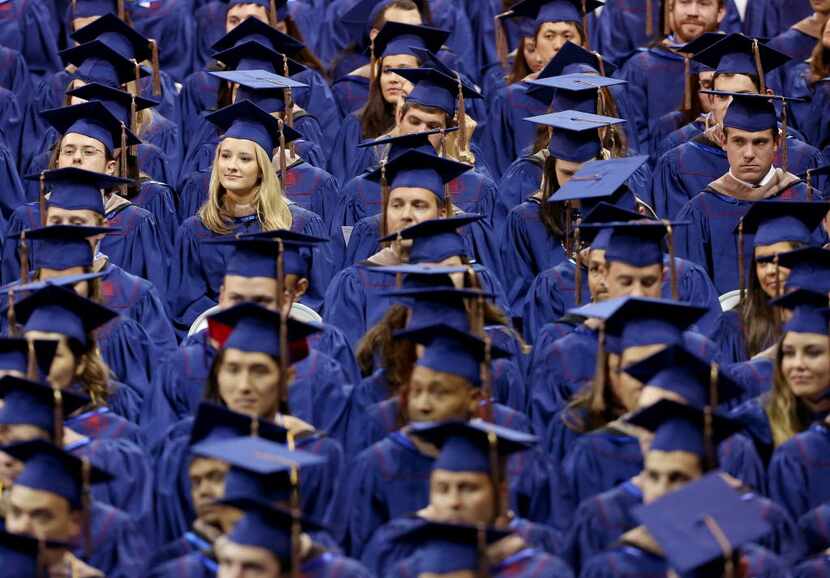 SMU Cox School of Business Class of '14 listen to speaker Dean Albert W. Niemi, Jr., as they...