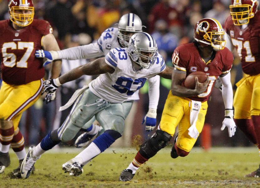 Dallas Cowboys outside linebacker Anthony Spencer (93) chases down Washington Redskins...