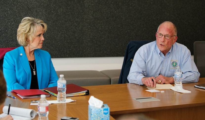 Sen. Bob Hall, R-Edgewood, answers questions as Rep. Cindy Burkett, R-Sunnyvale, listens...