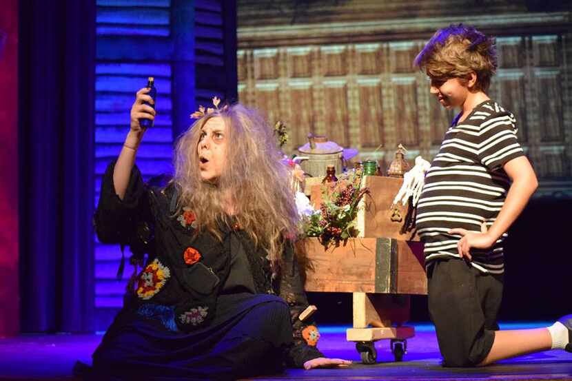 Kristen Brasher (Grandma Addams) helps out Cameron Dinger (Pugsley) during a production of...