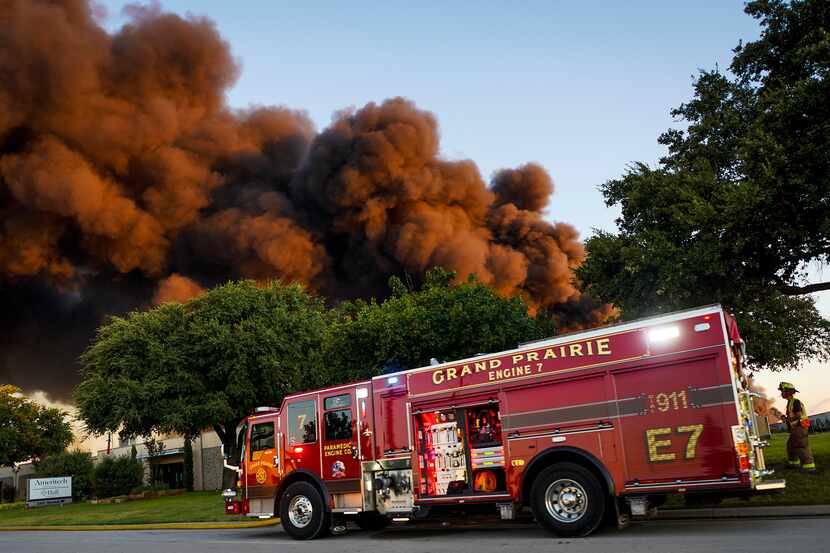 Fire crews battle a massive blaze in an industrial area of Grand Prairie just before sunrise...