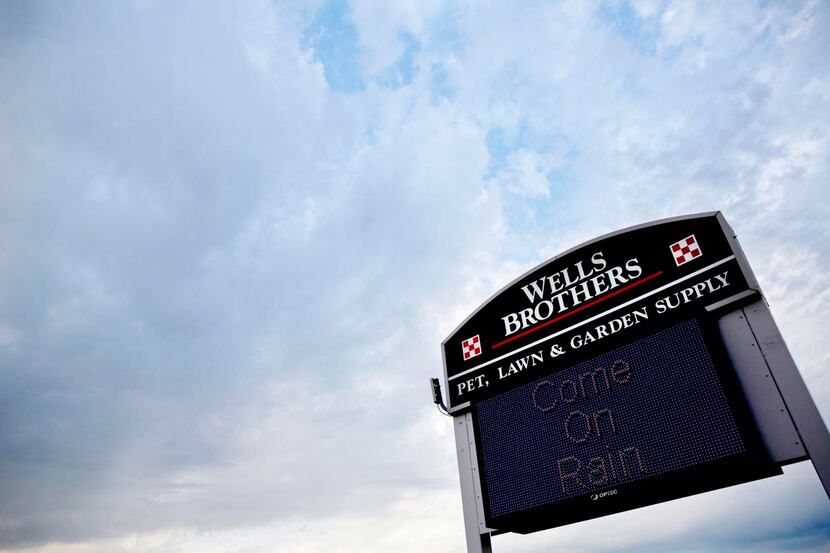 
A sign outside a Plano business tried to give a nudge to Mother Nature on Wednesday.
