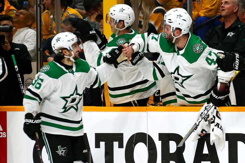 NASHVILLE, TENNESSEE - APRIL 10: Mats Zuccarello #36 of the Dallas Stars is congratulated by...