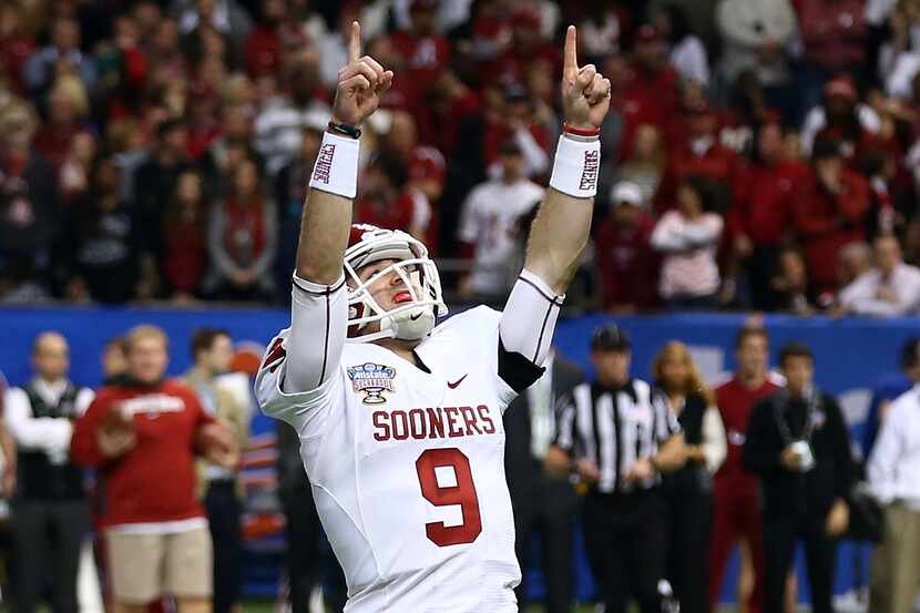 Trevor Knight of the Oklahoma Sooners reacts after a touchdown against the Alabama Crimson...