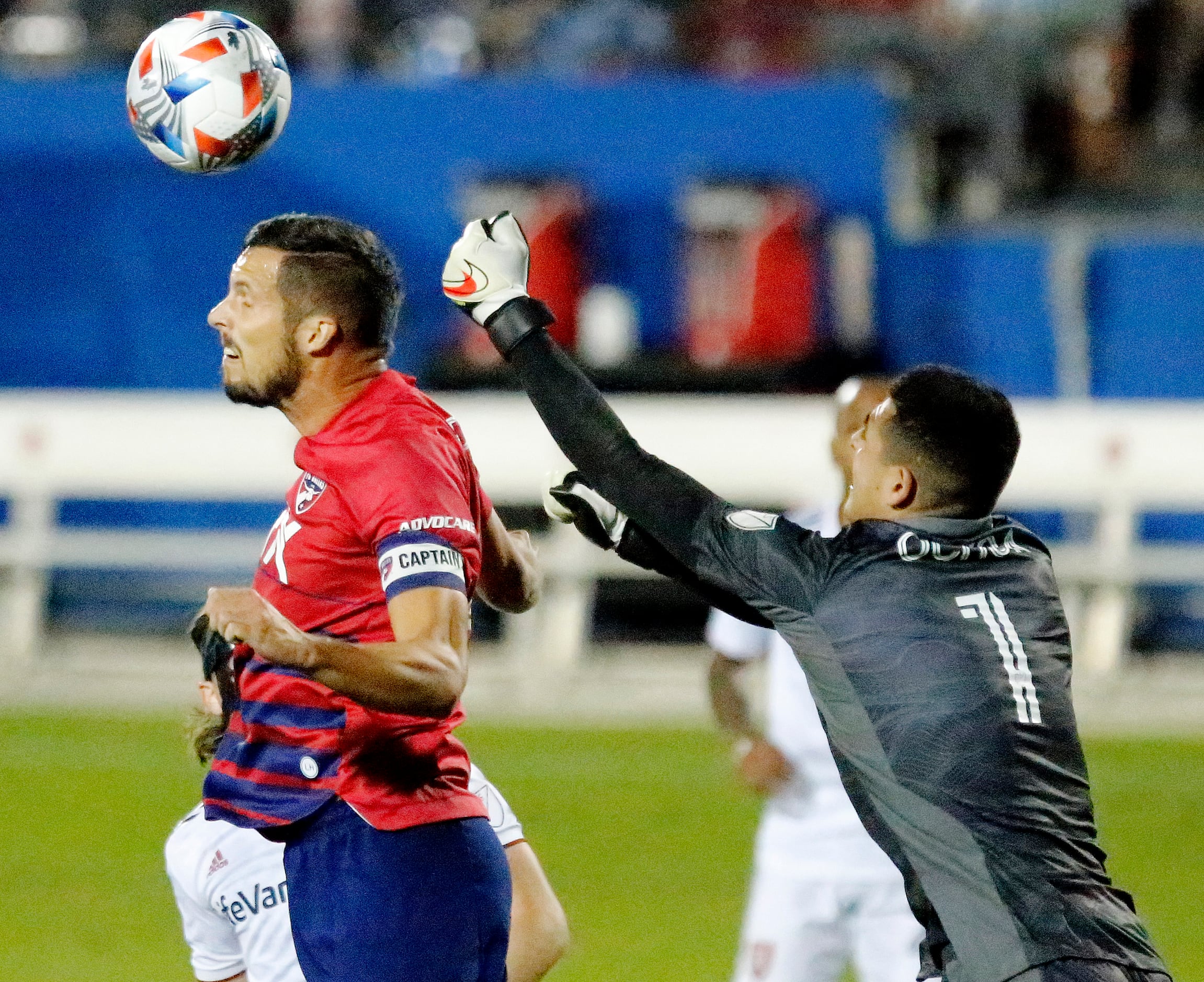 FC Dallas defender Matt Hedges (24) makes a header into the goal in front of Real Salt Lake...
