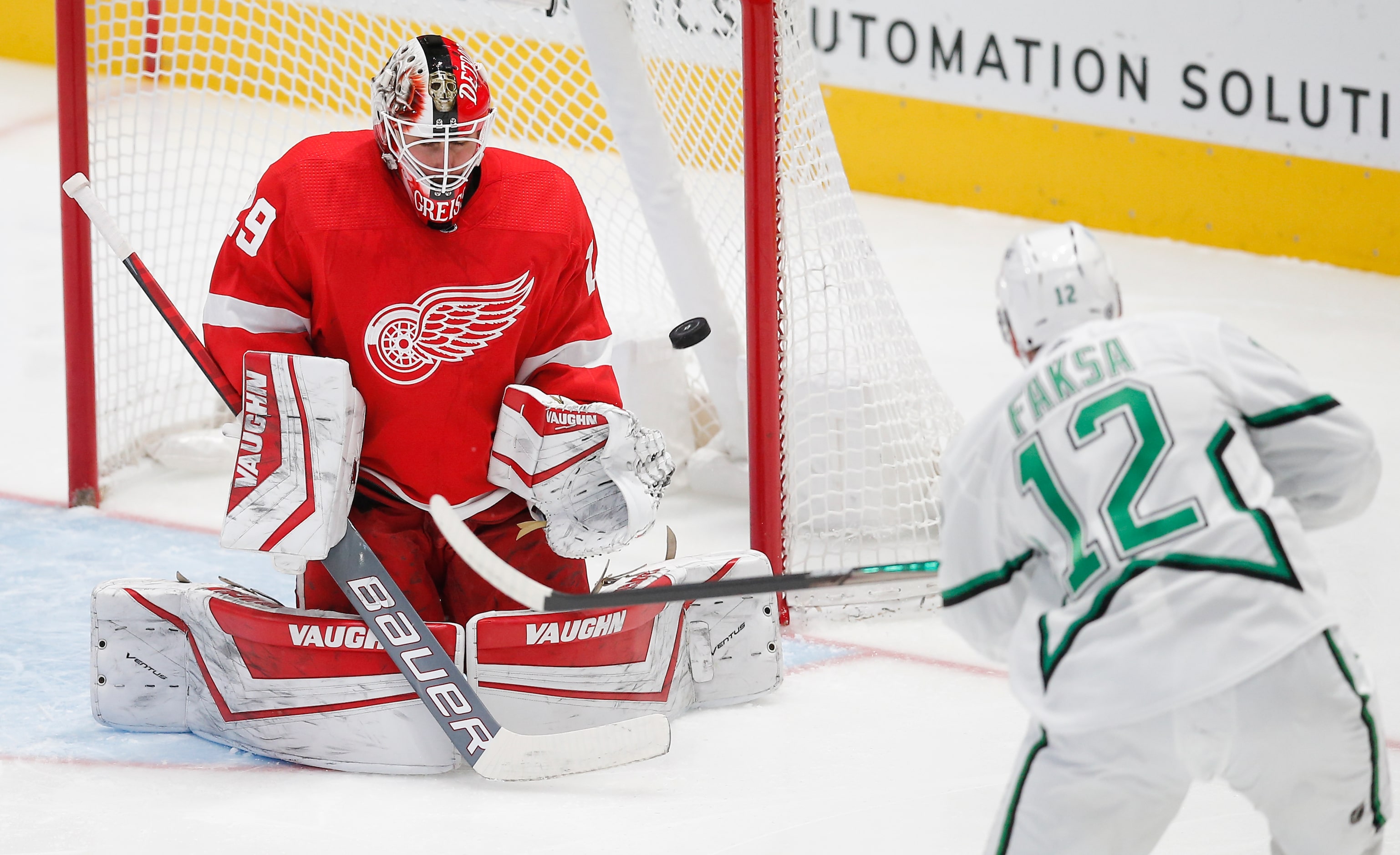 Dallas Stars forward Radek Faksa (12) shoots the puck off the post as Detroit Red Wings...