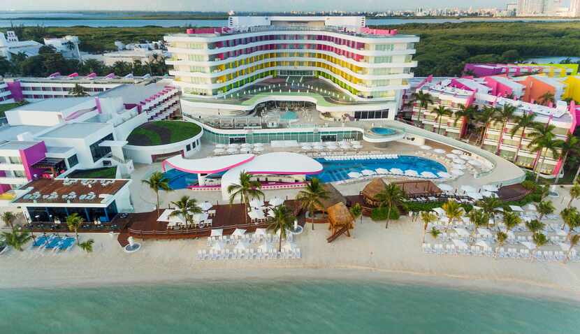 The architecture of Temptation Cancún Resort's main building resembles a huge hug. 