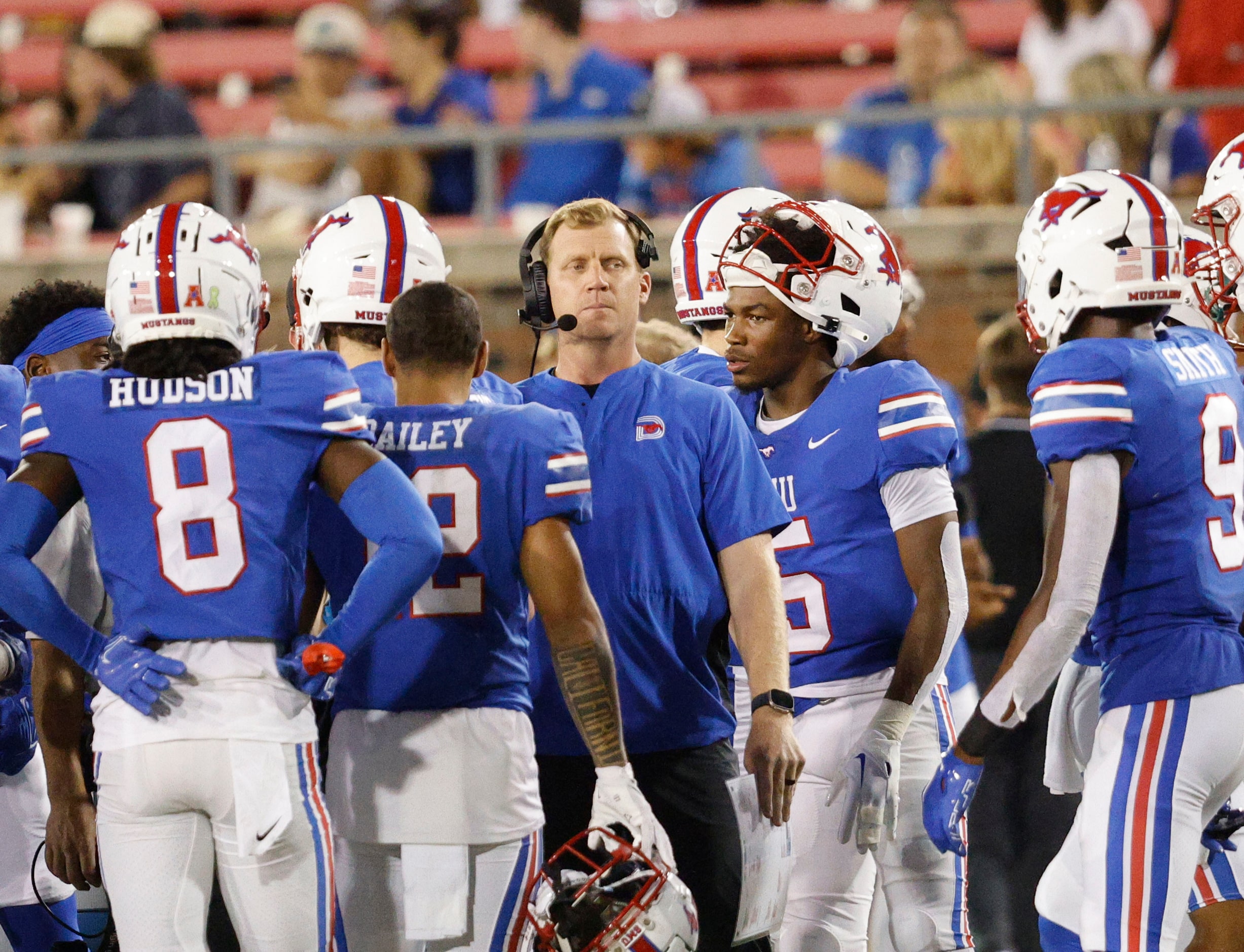 SMU head coach Rhett Lashlee, center, is seen during the second half of an NCAA college...