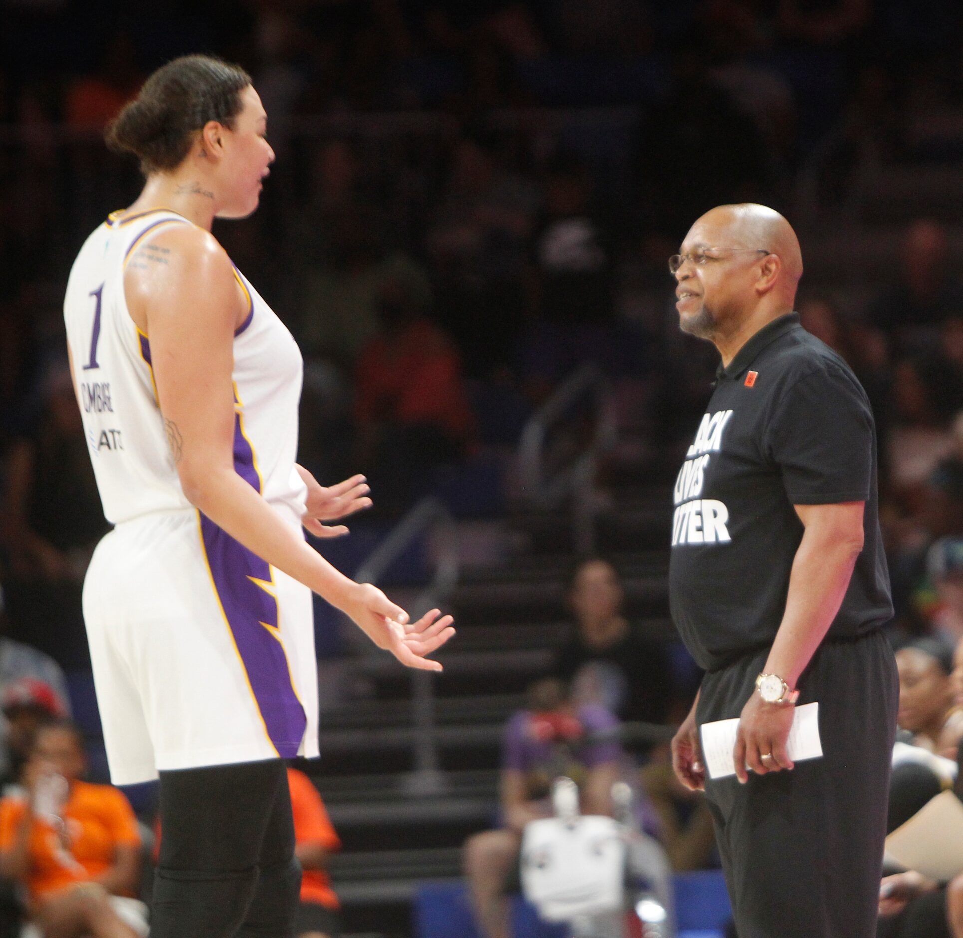 LA Sparks center Liz Cabbage (1) expresses her opinion to interim head coach Fred Williams...