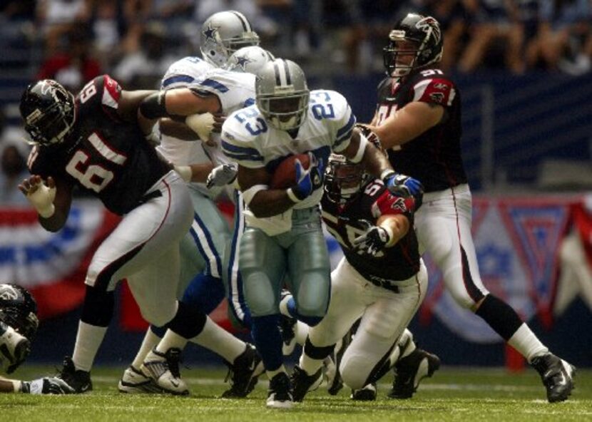 ORG XMIT: *S183E38B2* 07SEPT2003-IRVING, Texas:   Dallas running back Aveion Cason (23)...