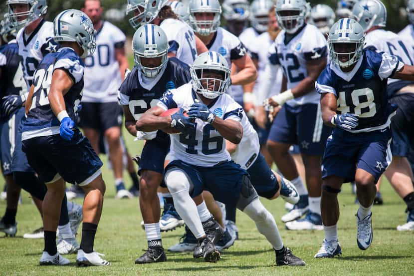 Dallas Cowboys running back Alfred Morris (46) runs the ball during practice on Wednesday,...