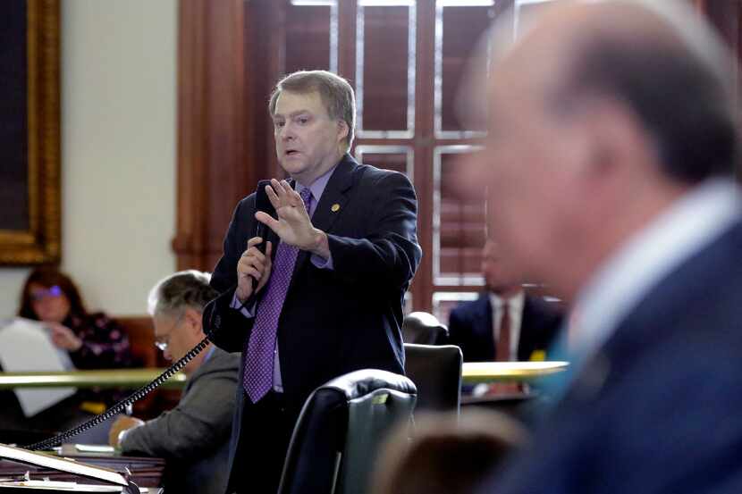 Texas Sen. Brian Birdwell, R-Granbury, left, debates a call for a convention of states that...