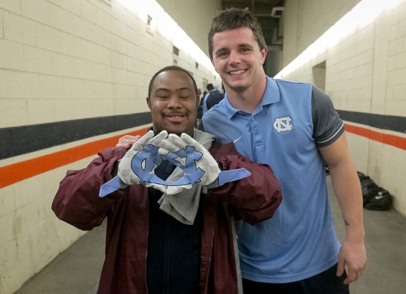 Ryan Switzer, right, poses with Clifton Reid, left, after a UNC game in 2016. They have been...