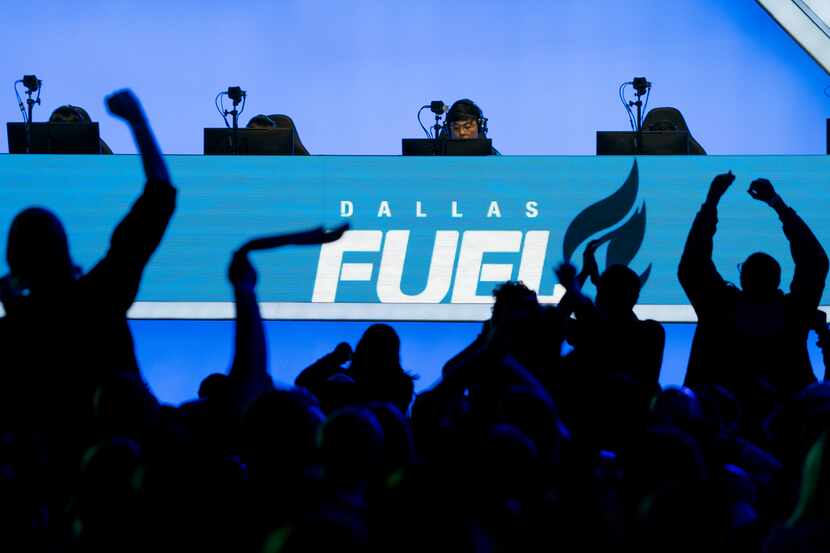 Fans cheer on the Dallas Fuel during a Overwatch League match against the Los Angeles...