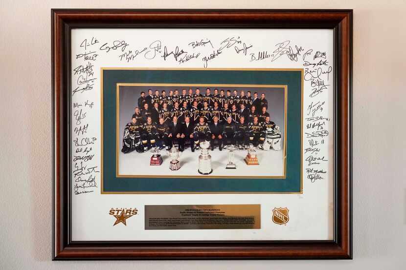 Donna Hanna's autographed photo of 1999 Stars Stanley Cup-winning team seen at her home on...