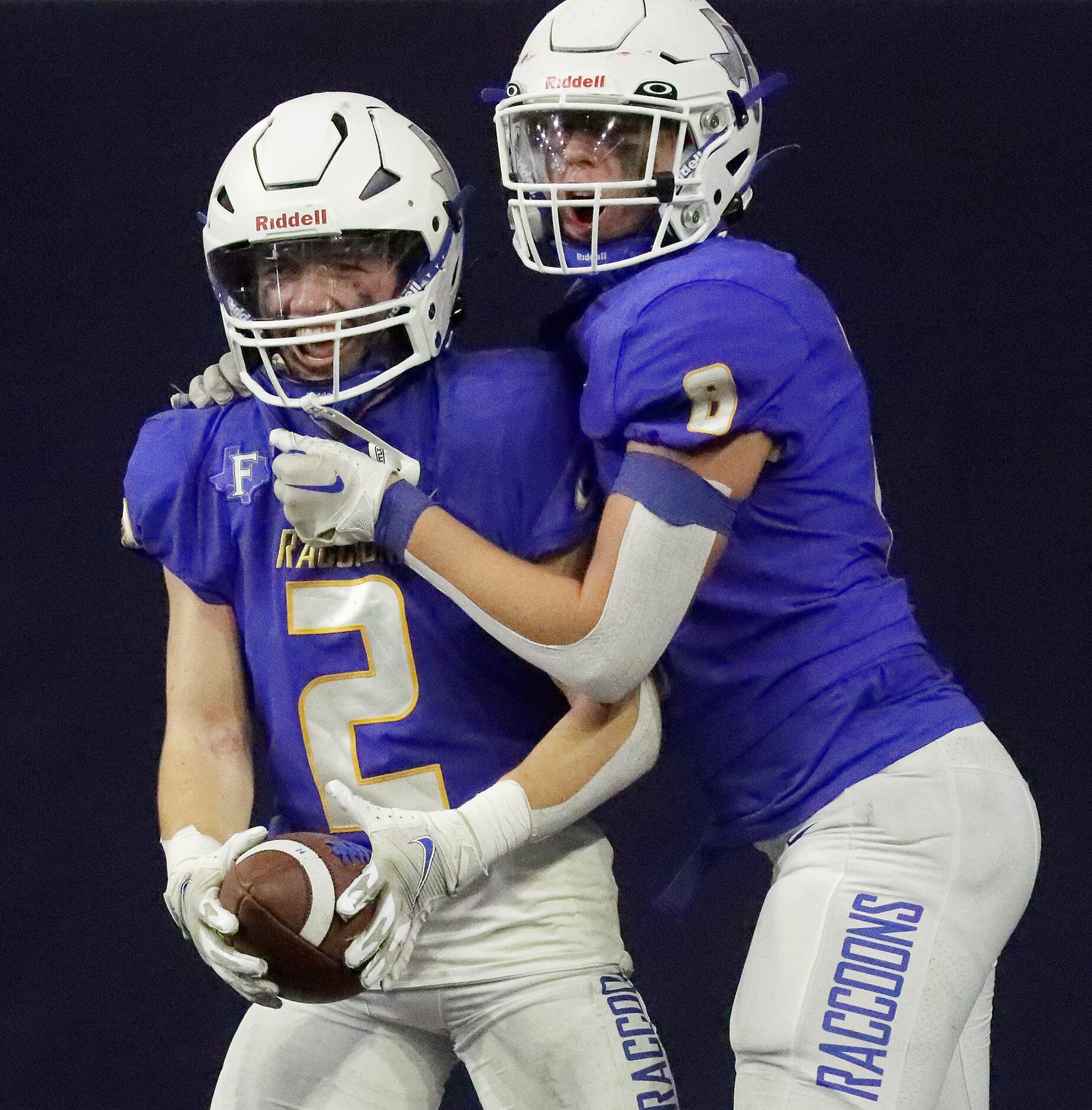 Frisco High School wide receiver Jackson Voris (2) celebrates a touchdown catch with Frisco...