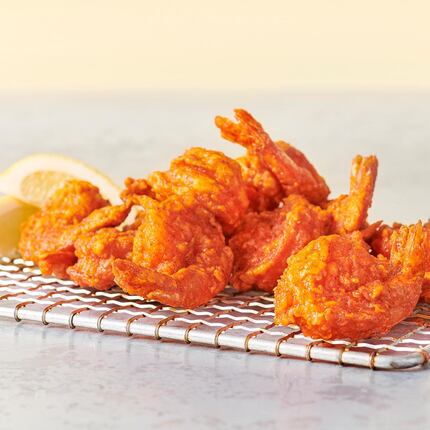 Hooters' buffalo shrimp are popular enough that new fast-casual company Hoots has added them...
