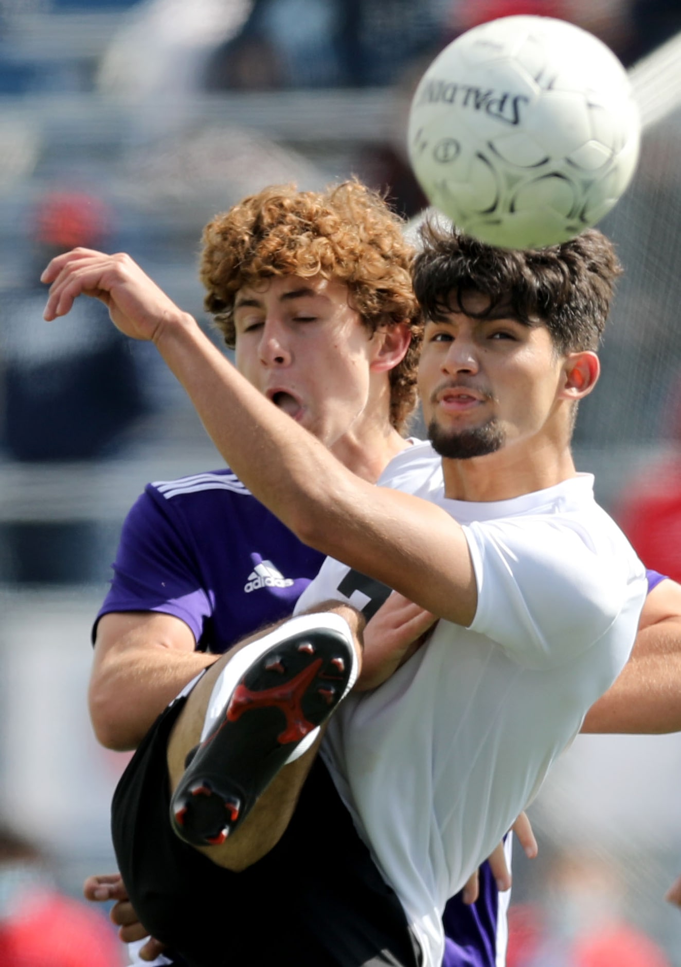 Fort Worth Diamond Hill-Jarvis' Luis Jaimes  (7) and Boerne's Joe Ballenger (10) struggle...