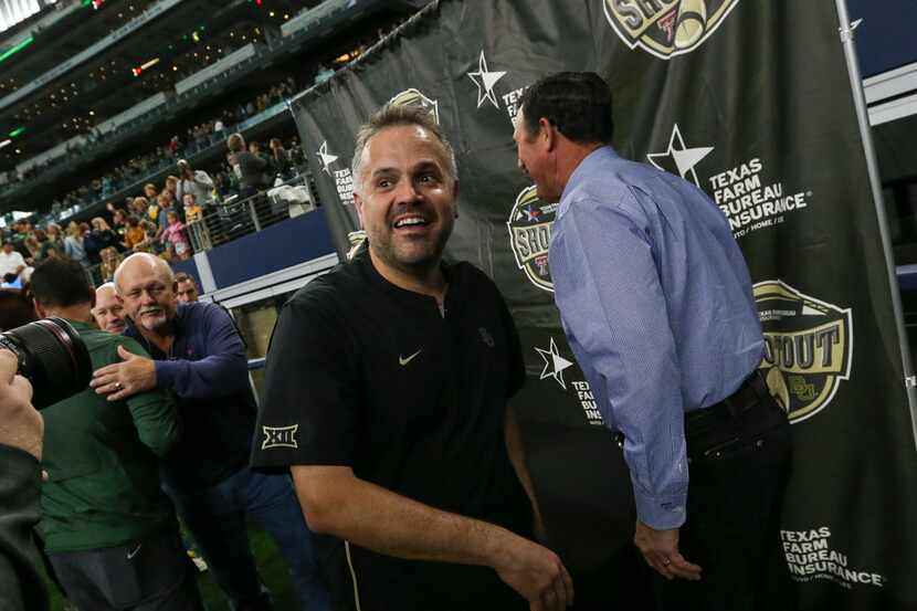 Baylor Bears head coach Matt Rhule makes his way off the field following the Baylor Bears...